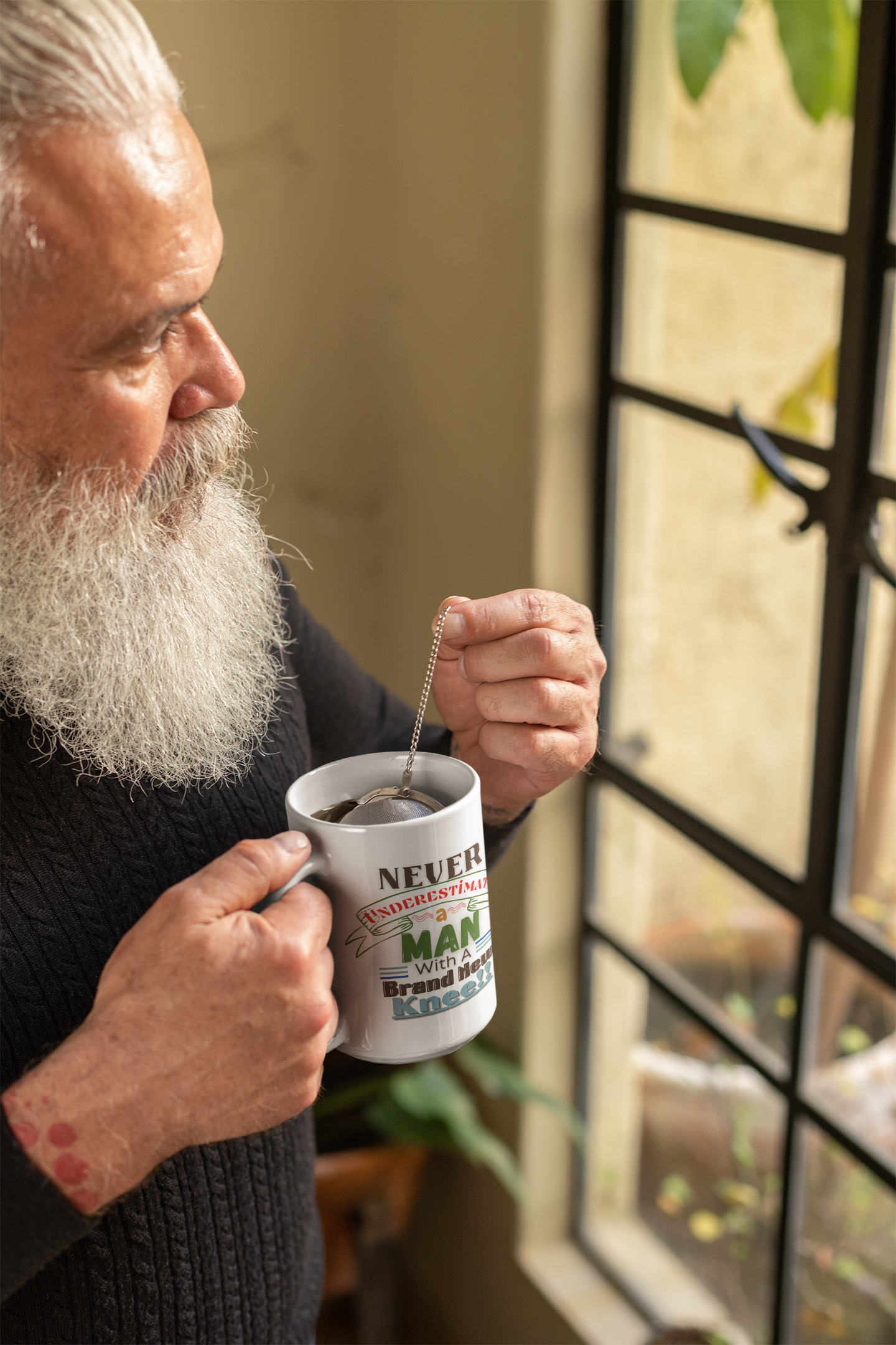 everwellaging.com-Never Underestimate A Man... 11oz or 15oz mug. Post Surgery Gift For The Bionic Man With A New Knee