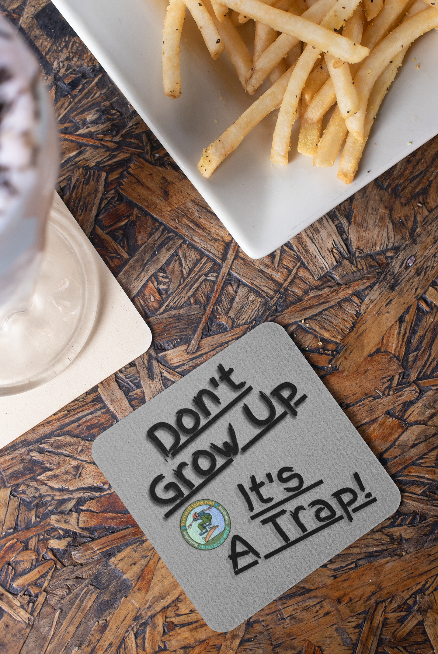 "Don't Grow Up.." Cork-back coaster